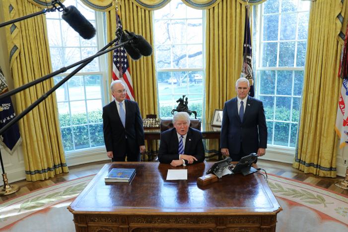 President Trump talks to journalists at the Oval Office of the White ...