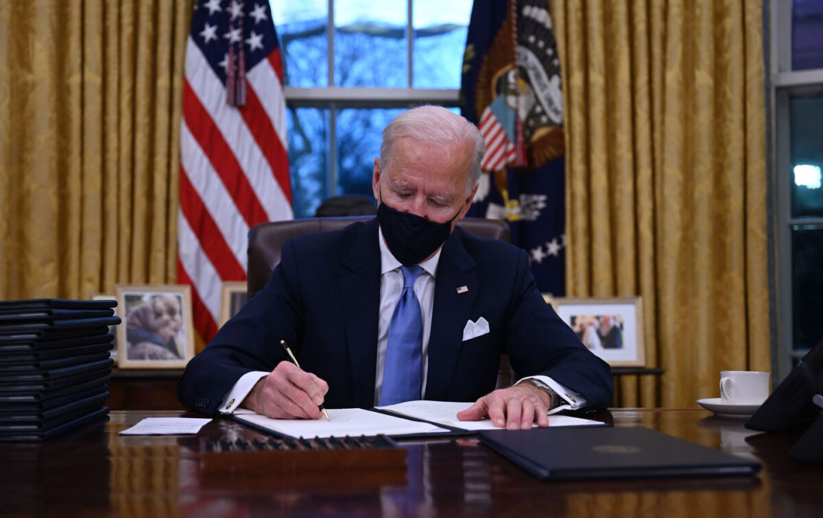 biden resolute desk inauguration gty 1200x756 - What A Difference A Day Makes: Coronavirus Peaks, Biden Signs Executive Orders Reversing 45's Destructive Course