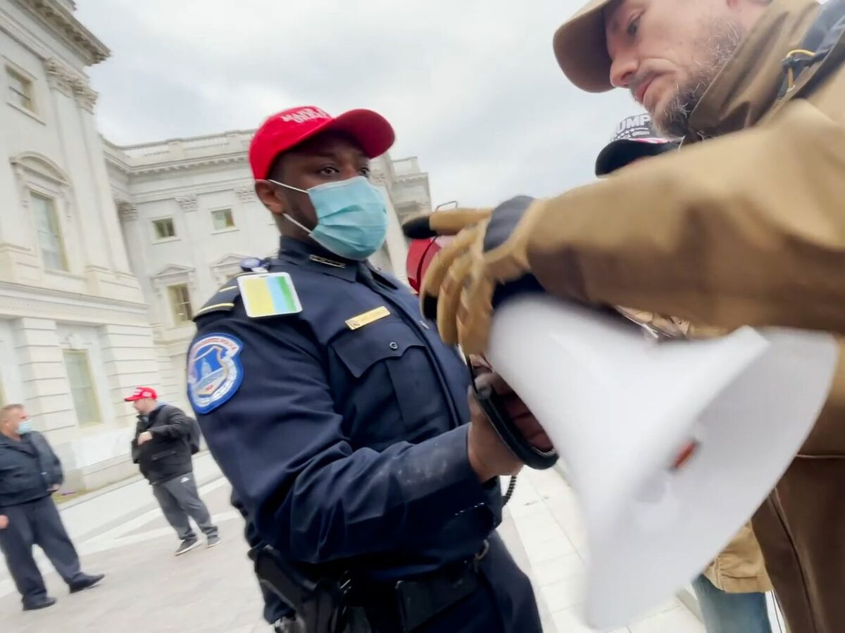 CapitolPoliceOfficer MAGA cap 1200x900 - Capitol Police Issue Statement Announcing Discipline of Six Officers for Improper Conduct During Jan. 6 Insurrection