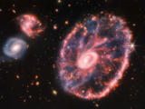 Cartwheel galaxy1red 160x120 - NASA Telescopes Find Close Neighbor of the Sun