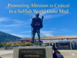 Gandhi statue headline 160x120 - Countering the Con of Trump and Project 2025: In Altruism Lies the Answer, Not the Selfish Gene